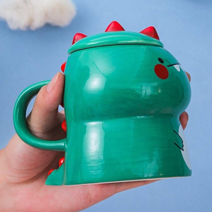 https://www.kawaiies.com/cdn/shop/products/kawaiies-plushies-plush-softtoy-cute-cartoon-dinosaur-ceramic-mug-with-lid-new-home-decor-274711.jpg?v=1646331672