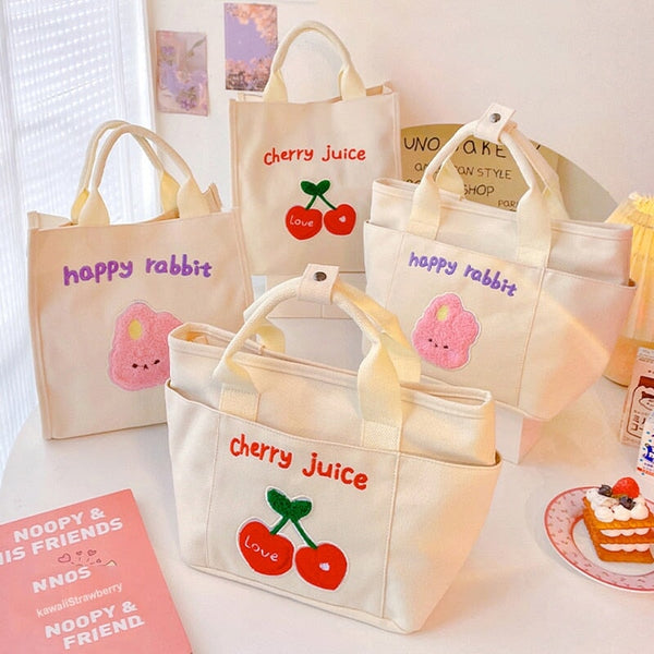 https://www.kawaiies.com/cdn/shop/products/kawaiies-plushies-plush-softtoy-cute-cherry-bunny-canvas-lunch-bags-new-bags-555995_grande.jpg?v=1674855100