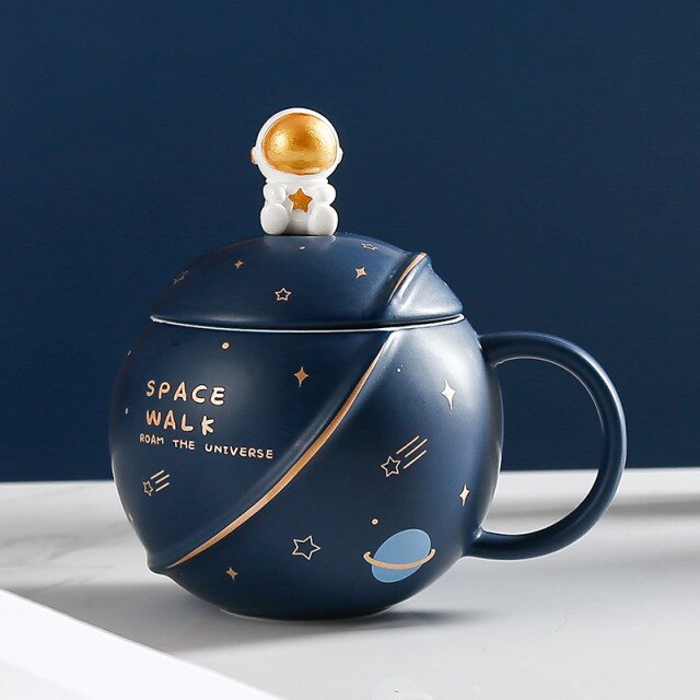 https://www.kawaiies.com/cdn/shop/products/kawaiies-plushies-plush-softtoy-space-astronaut-planet-ceramic-mug-with-lid-and-spoon-new-home-decor-navy-blue-astronaut-866968.jpg?v=1646327797